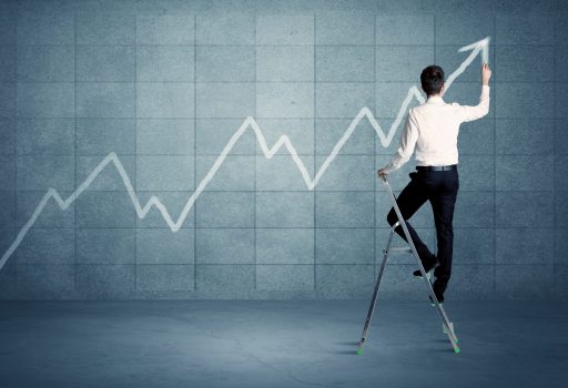 Man drawing line from ladder